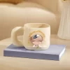 Série DIMOO Weaving Wonders – Tasse en céramique