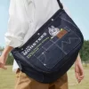 SÉRIE LES MONSTRES TOMBERENT À L&rsquo;ÉTAT SAUVAGE – Sac messager en denim